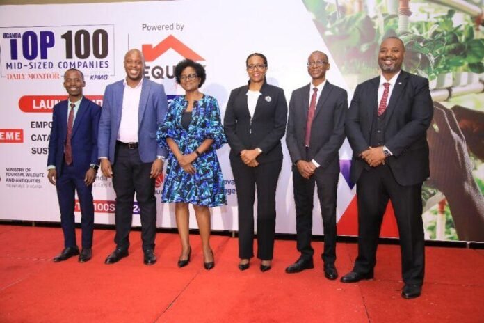Officials from Nation Media Group, KPMG Uganda, Equity Bank Uganda, and the Ministry of Tourism during the launch of the 2026 Uganda Top 100 Mid-Sized Companies Survey in Kampala.