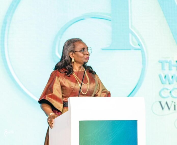 Ibukun Awosika speaking at a business leadership conference, highlighting the importance of delegation and effective leadership.